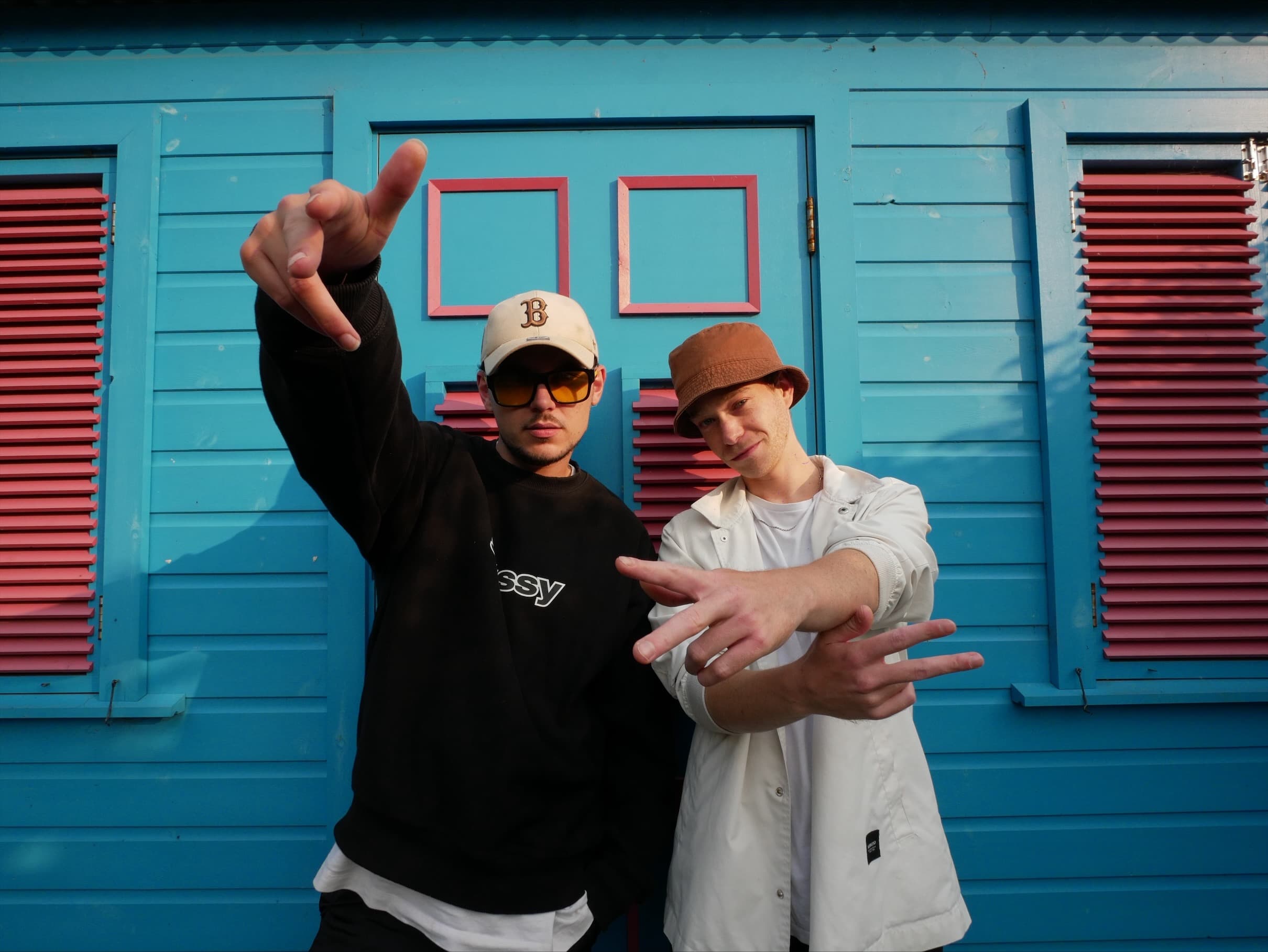 Kenny in front of beach hut